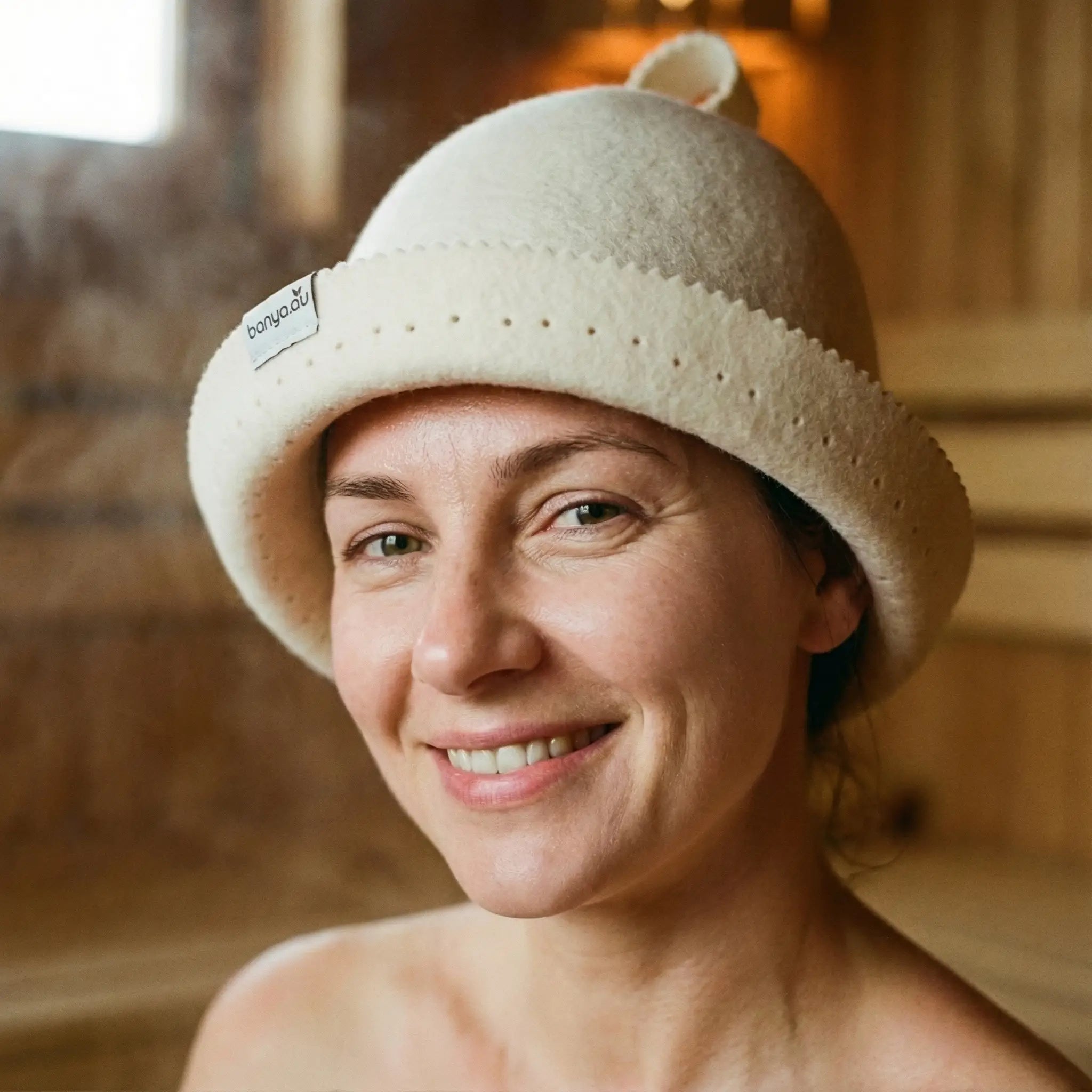 Adjustable Australian Merino Wool Sauna Hat providing soft comfort in a sauna