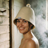 Australian Merino Wool Sauna Hat designed for long hair and sensitive skin worn in a traditional sauna