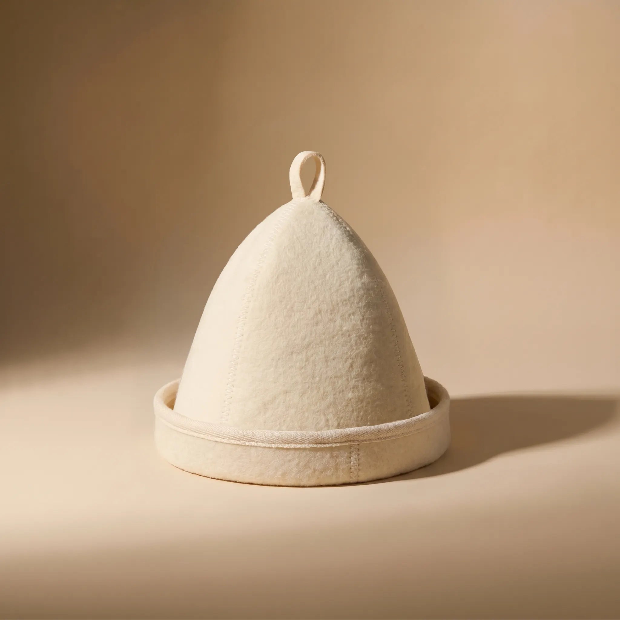 Traditional thick wool sauna hat for long hair with folded brim made from natural New Zealand wool felt